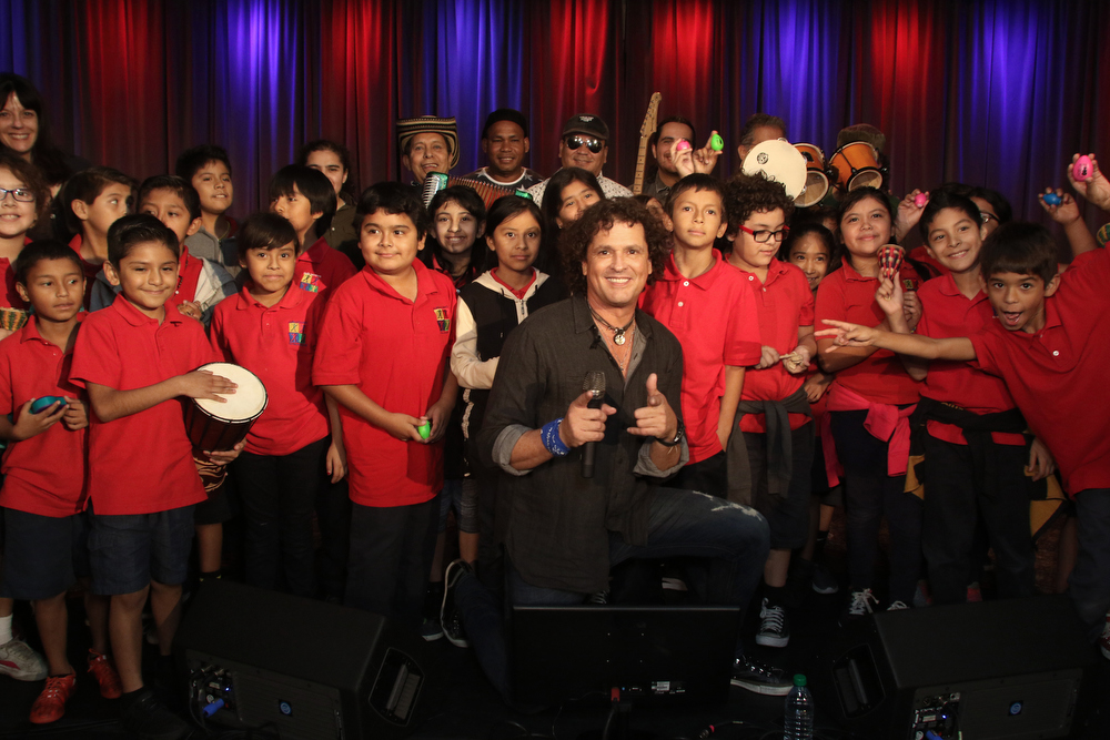 Singer Carlos Vives and 4h Graders from Para Los Niños make music at The Grammy Museum on October 23, 2015 in Los Angeles, California (Photo by Jc Olivera)